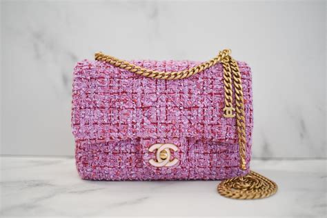 chanel pink tweed flap bag.